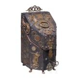 A copper and coin-mounted leather cutlery casket