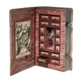 A book-shaped poison cabinet with stag beetle, German, ca. 1900