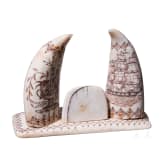 A walrus tusk scrimshaw showing the Whaler Ionia, Ship Master J. Warren (1821-29), 19th century