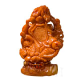 A figural amber carving showing a mother with her child