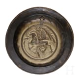 A small brass alms dish, Nuremberg, mid-16th century