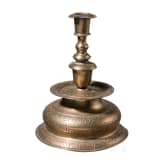 A large engraved Nuremberg brass bell-bottom candlestick, ca. 1670/80
