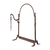 A large iron French or Spanish andiron, 16th/17th century