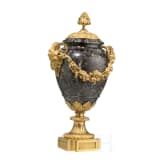 A French ormolu-mounted Louis XVI marble vase with ram's heads, 19th century