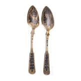 Two Russian silver-gilt and niello spoons with case, Moscow, 1835