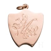 A Russian 18ct gold medallion set with ruby and diamonds