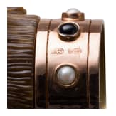 A gold-mounted dog-head shaped agate stone cane handle in the manner of Faberg&eacute;, 20th century