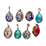 Eight Russian silver-gilt and enamelled egg-pendants, 20th century