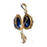 Eight Russian silver-gilt and enamelled egg-pendants, 20th century