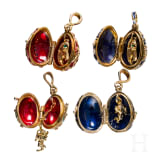 Five Russian silver-gilt and enamelled egg-pendants, 20th century