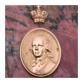 A 14ct gold-mounted rhodonite paperweight showing Tsar Paul I of Russia, 20th century