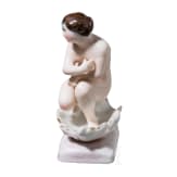 An erotic porcelain figure of a lady, Russian private manufacture, mid-19th century