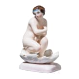 An erotic porcelain figure of a lady, Russian private manufacture, mid-19th century