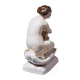 An erotic porcelain figure of a lady, Russian private manufacture, mid-19th century