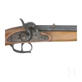 An Italian and an English percussion pistol, 1973 and 1857
