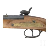 An Italian and an English percussion pistol, 1973 and 1857