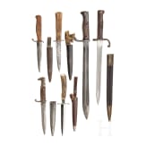 Two bayonets and four trench daggers