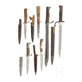Two bayonets and four trench daggers