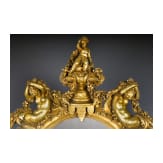 An opulent wall mirror after a design by Fran&ccedil;ois Linke, 2nd half of the 20th century
