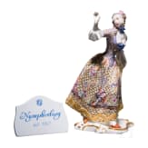 A porcelain figure "Leda" from the Italian Commedia dell'arte, Franz Bustelli (design), Nymphenburg, 20th century (finish), and a porcelain shield "Nymphenburg"