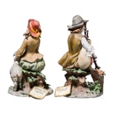 Two Italian biscuit porcelain figures (couple) of a boy with bagpipe and a girl feeding a goat, Benaccio (design), Capodimonte, Triade, 20th century