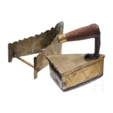 A Dutch/Scandinavian iron with stand, dated 1832