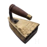 A Dutch/Scandinavian iron with stand, dated 1832