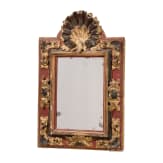 A carved Baroque mirror, probably German, 18th century