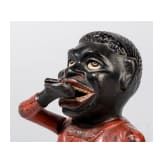 A U.S./English piggy bank "Jolly Nigger-Bank", circa 1900