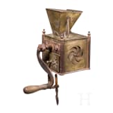 An early coffee grinder and a flatiron, probably French, dated 1864