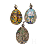 Three Russian silver and cloisonn&eacute;-enamel egg pendants, 20th century
