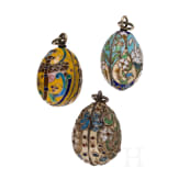 Three Russian silver and cloisonn&eacute;-enamel egg pendants, 20th century
