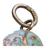 Three Russian silver and cloisonn&eacute;-enamel egg pendants, 20th century