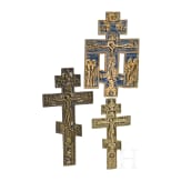 Three Russian brass crucifixes (two with enamel), 19th/20th century