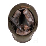 A steel helmet M 16 with camouflage painting