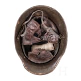 A steel helmet M 16 with remnants of camouflage paint