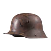 A steel helmet M 16 with remnants of camouflage paint