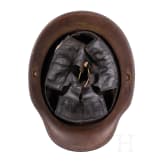 A steel helmet M 16 with remnants of camouflage paint