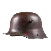 A steel helmet M 16 with camouflage painting