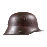 A steel helmet M 16 with camouflage painting