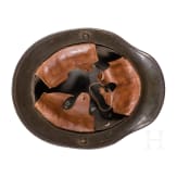A steel helmet M 16 with camouflage painting