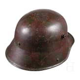 A steel helmet M 16 with camouflage painting