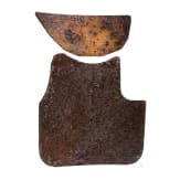 Two fragments of an allied breastplate in World War I