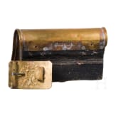 A fur hat, so-called "Papacha", a Russian belt buckle, and a cartridge box dummy
