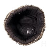 A fur hat, so-called "Papacha", a Russian belt buckle, and a cartridge box dummy