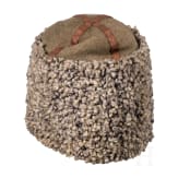 A fur hat, so-called "Papacha", a Russian belt buckle, and a cartridge box dummy