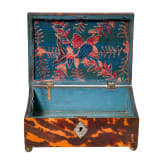 A wood and tortoiseshell casket, circa 1800