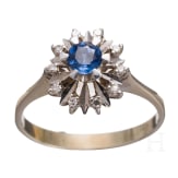 A 18ct whitegold sapphire and diammond ring