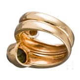 A 18ct gold snake-shaped ring with diamond and emerald