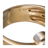 A 18ct gold snake-shaped ring with diamond and emerald
